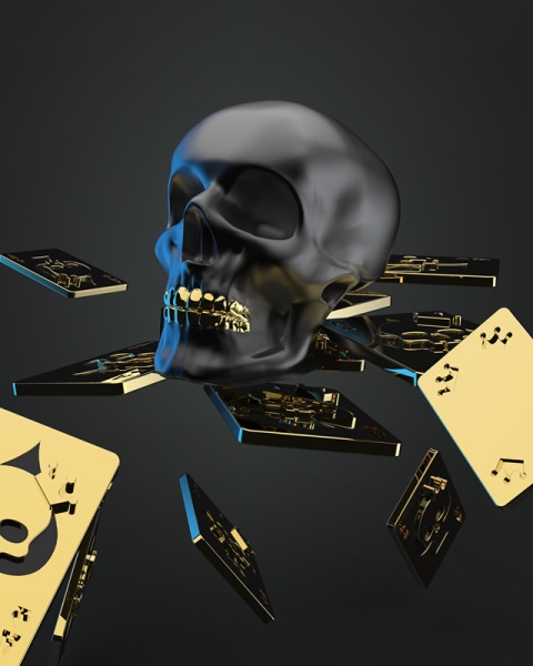 Фото Брелок для ключей "Черный череп и игральная карта"