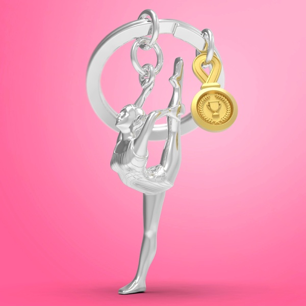 Фото Брелок для ключей "Гимнастка с золотым трофеем"